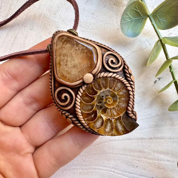 Natural crystal jewelry necklace with citrine and ammonite