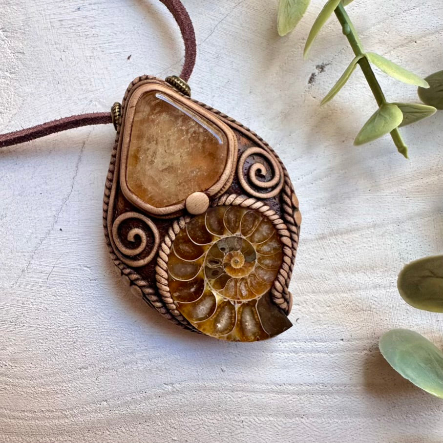 Spiritual crystal necklace featuring citrine and ammonite