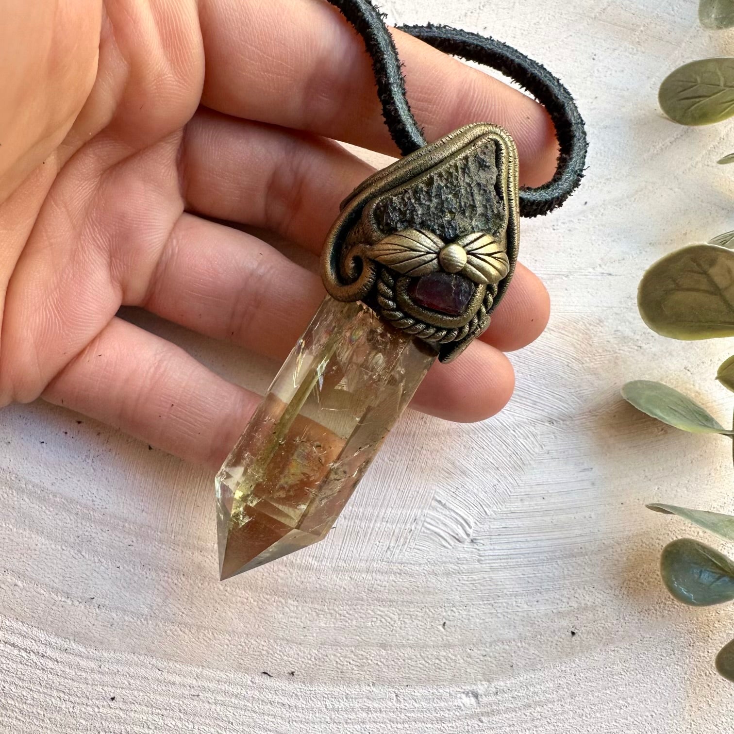 Spiritual necklace featuring polished citrine and moldavite
