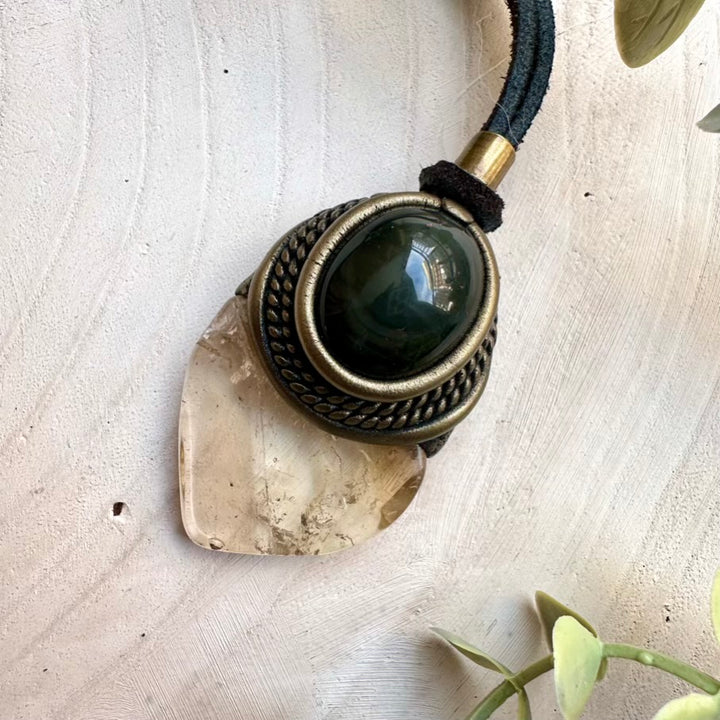 Spiritual crystal pendant necklace combining citrine and rainbow obsidian