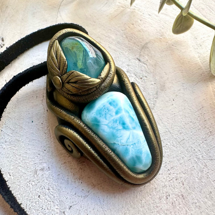 Crystal talisman necklace made with genuine Larimar and Aqua Aura Quartz.