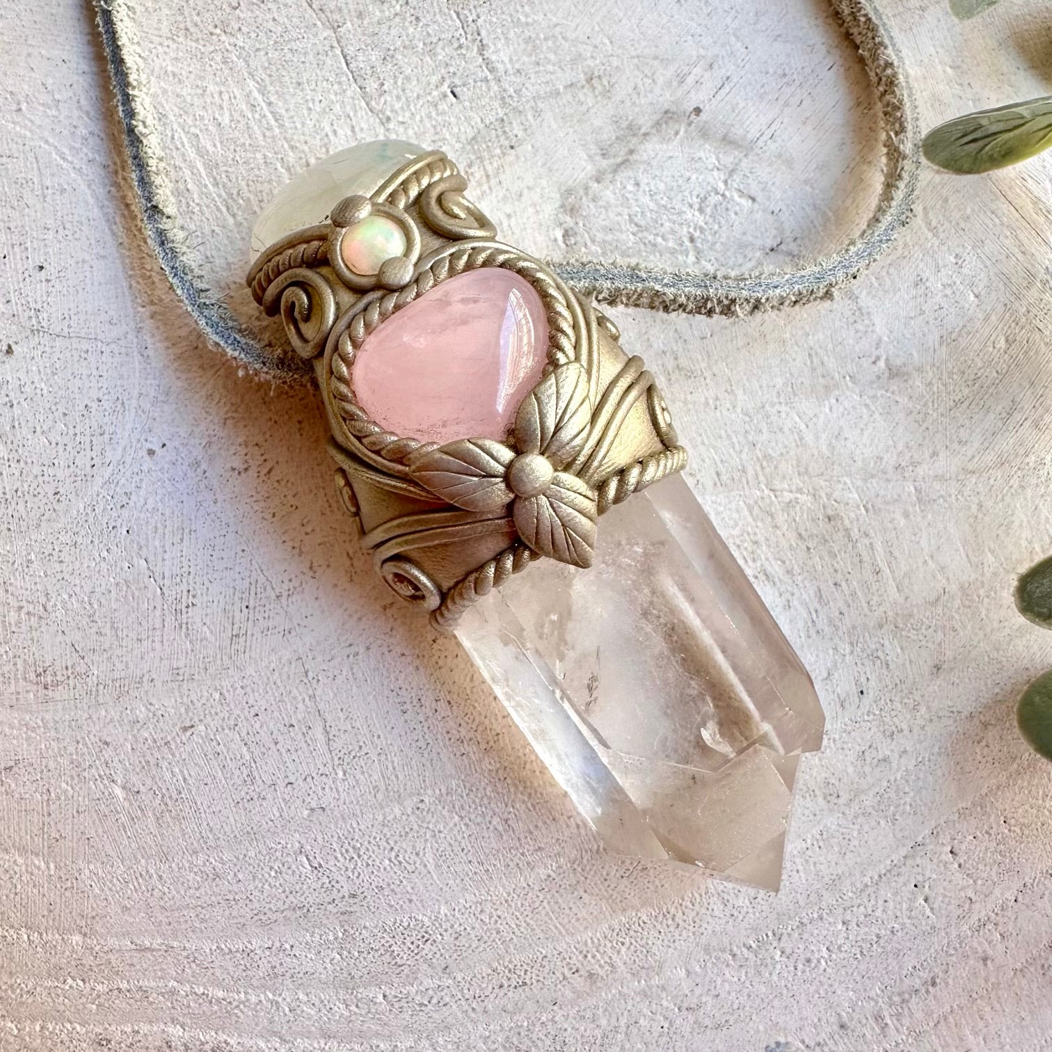 Unique healing crystal wand necklace featuring Clear Quartz and a Rose Quartz Heart with Moonstone and Ethiopian Opal. A unique spiritual gemstone talisman for meditation, energy work, intention setting and everyday wear.