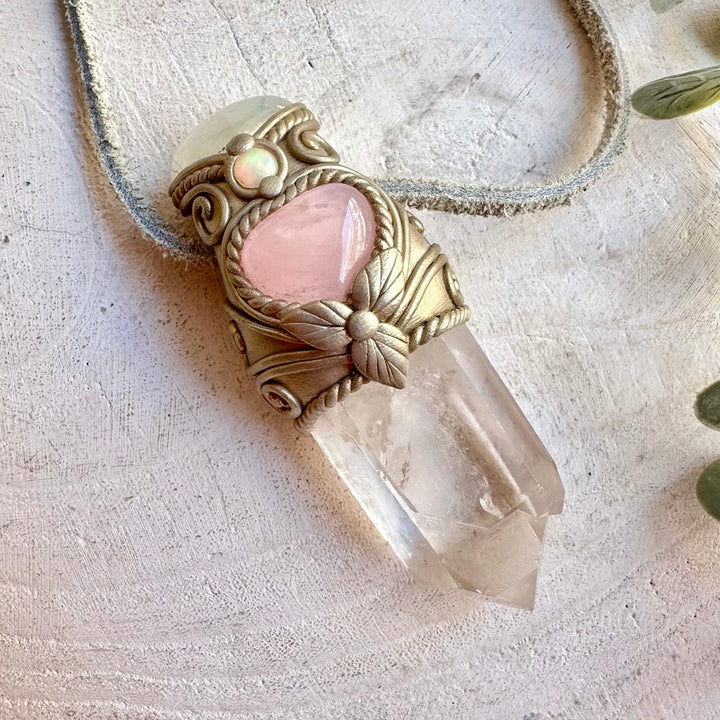 Unique healing crystal wand necklace featuring Clear Quartz and a Rose Quartz Heart with Moonstone and Ethiopian Opal. A unique spiritual gemstone talisman for meditation, energy work, intention setting and everyday wear.