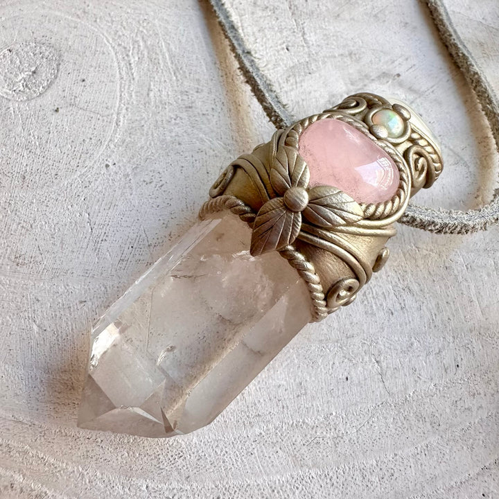 Handmade healing crystal jewelry combining Clear Quartz with Rose Quartz, Moonstone and Ethiopian Opal.