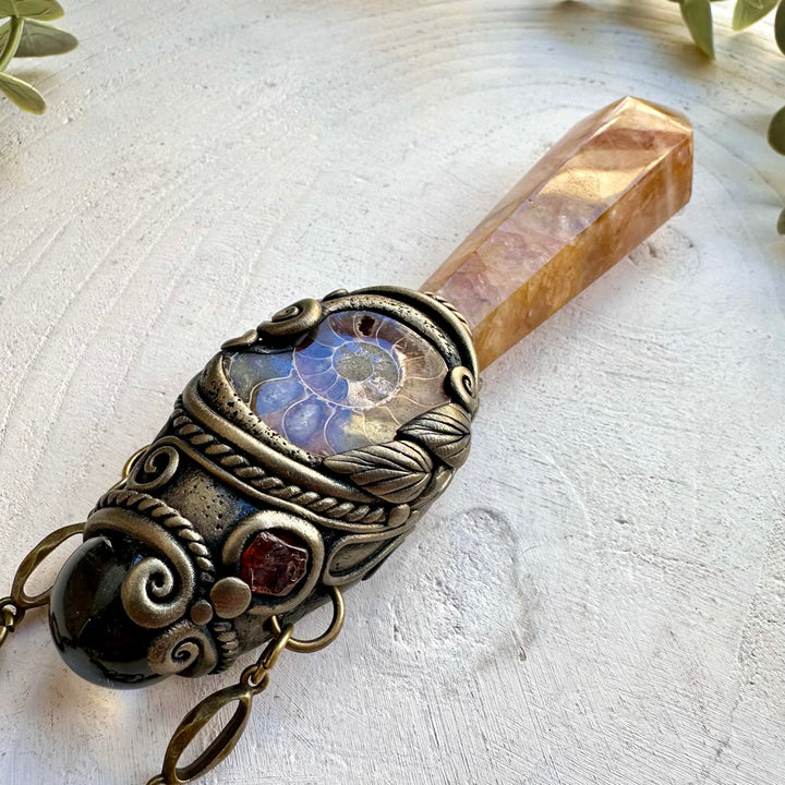 Energy healing wand with clear quartz sphere and golden healer