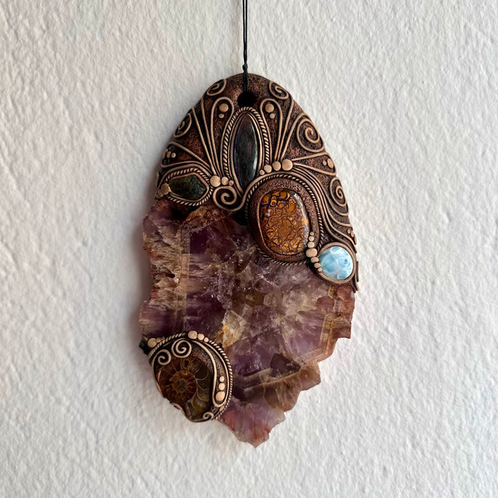 Unique spiritual wall art with larimar labradorite and red garnet crystals