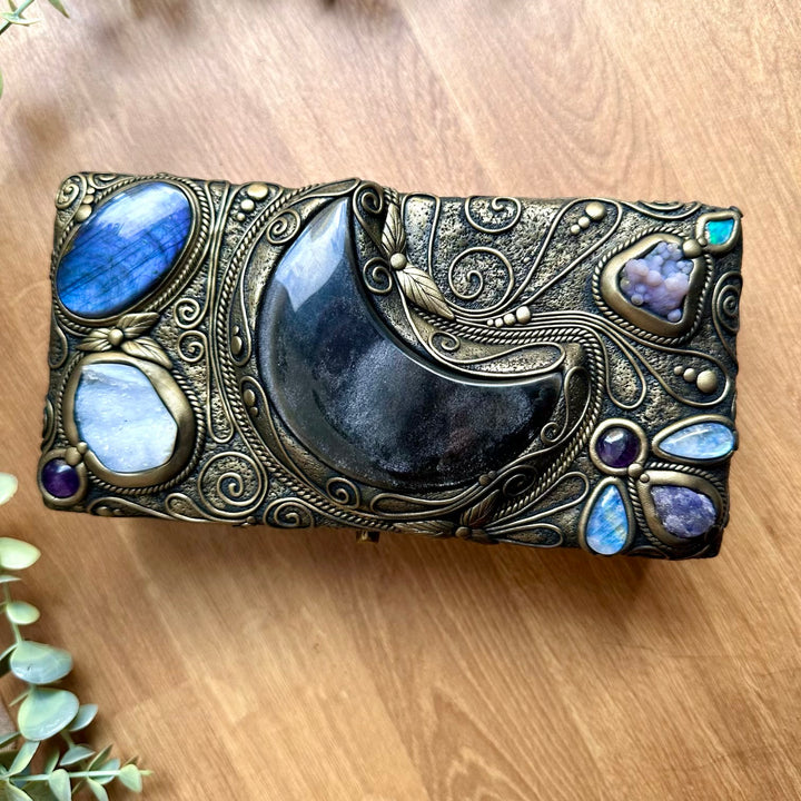 Spiritual home decor wooden box adorned with healing crystals and gemstones