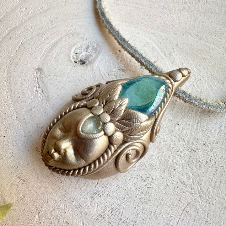 Spiritual goddess crystal necklace talisman with aqua aura quartz and blue topaz