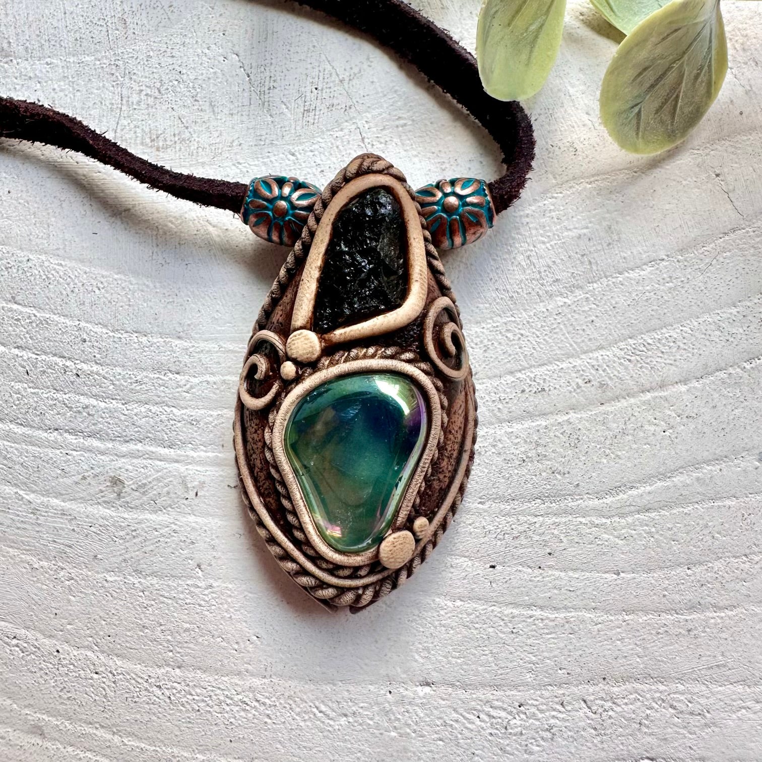 One of a kind crystal talisman necklace made with Aqua Aura Quartz and Moldavite.
