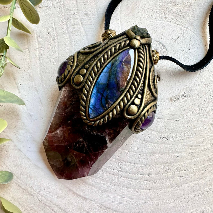 Unique Healing gemstone crystal wand featuring Super Seven Quartz and colorful natural crystals.