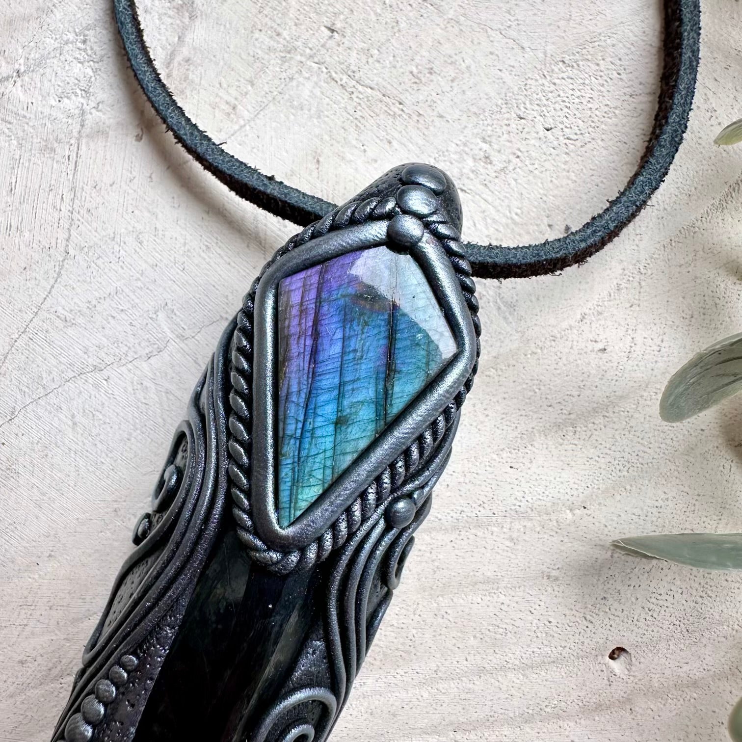Unique handmade crystal jewelry pendant with moldavite