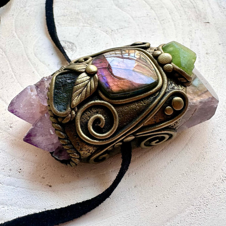 Spiritual crystal pendant featuring Super Seven Quartz with Spirit Quartz Cluster and natural gemstone accents.