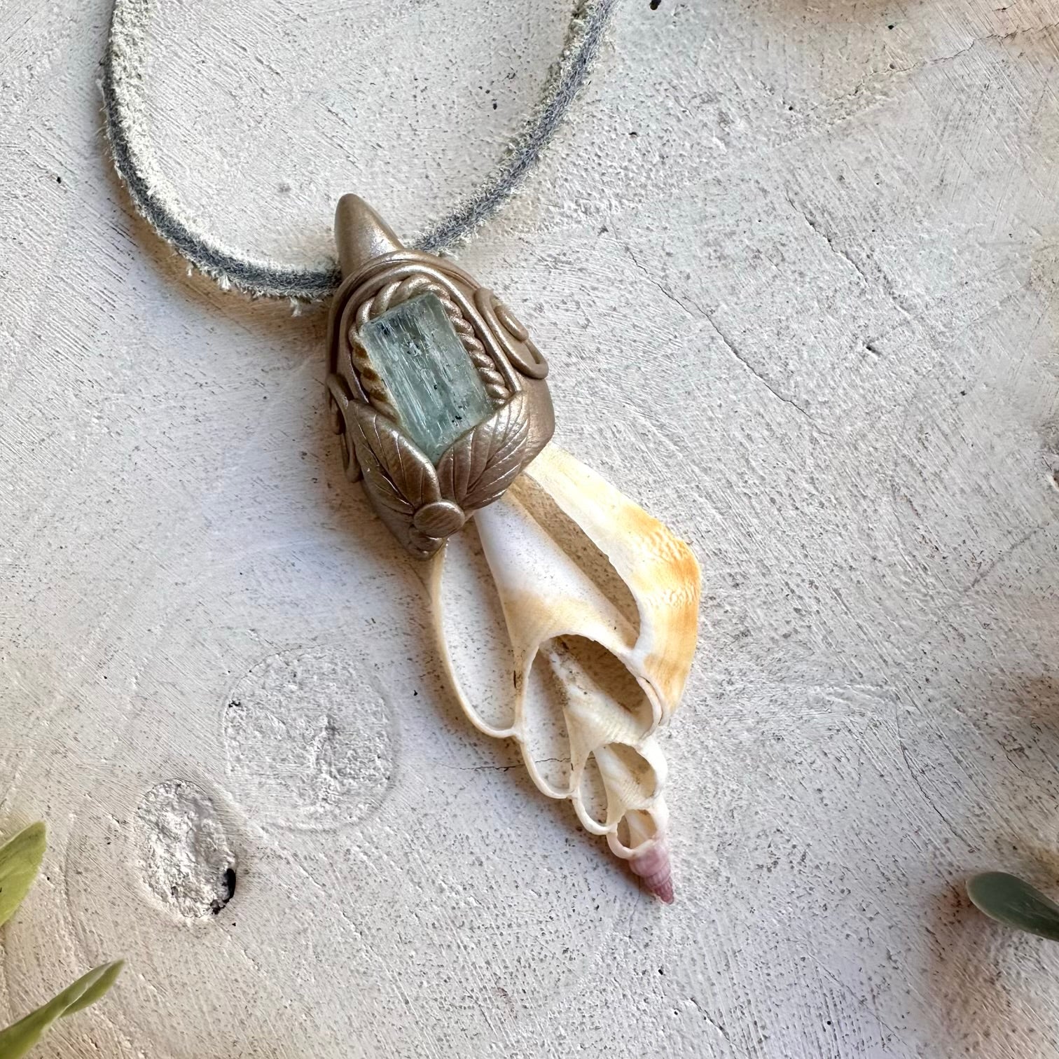 Ocean crystal talisman necklace with seashell slice and aquamarine gemstone