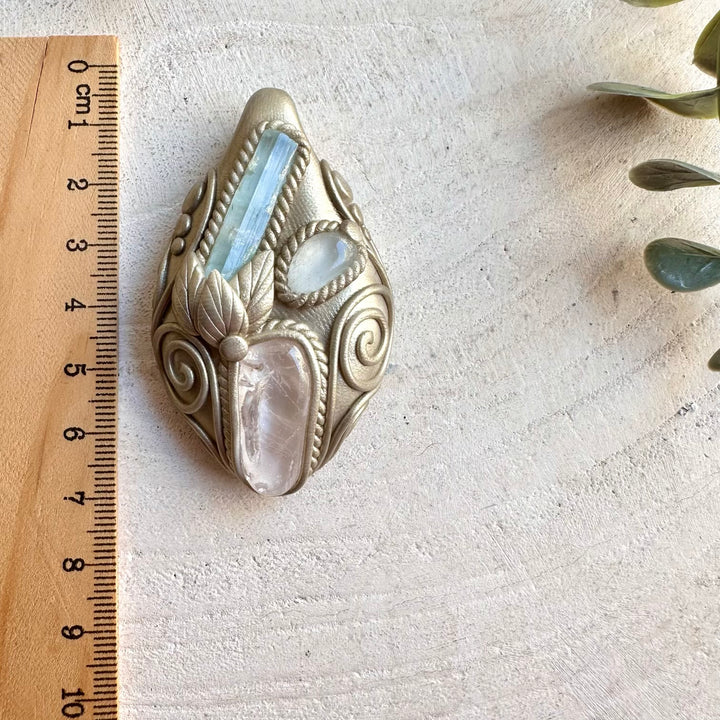 Handmade pendant necklace featuring Aquamarine, Danburite and Clear Topaz gemstones.