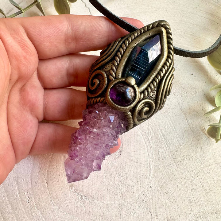 Handmade Deep Purple Spirit Quartz crystal wand pendant necklace featuring Aqua Aura Quartz and Amethyst, a one of a kind healing crystal talisman designed for spiritual awakening, intuition, inner peace and higher consciousness.