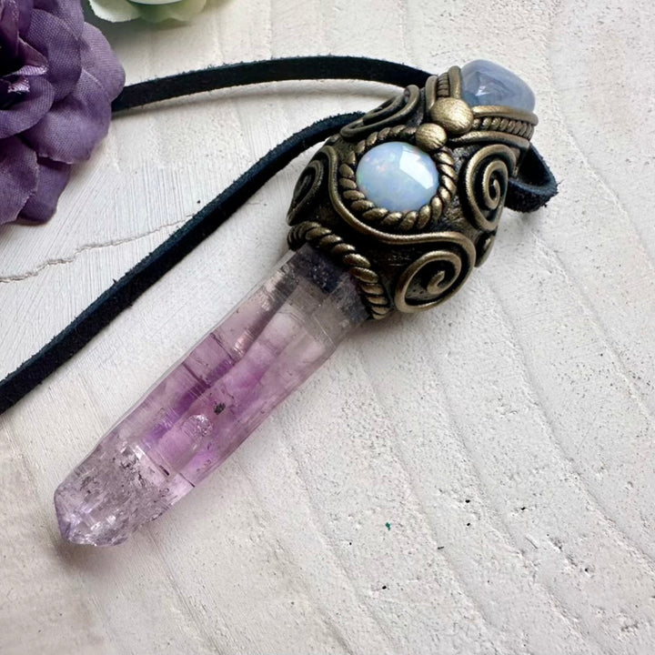 Spiritual crystal amulet featuring Vera Cruz Amethyst, Australian Opal shimmer and glowing Rainbow Moonstone, artisan handmade jewelry.