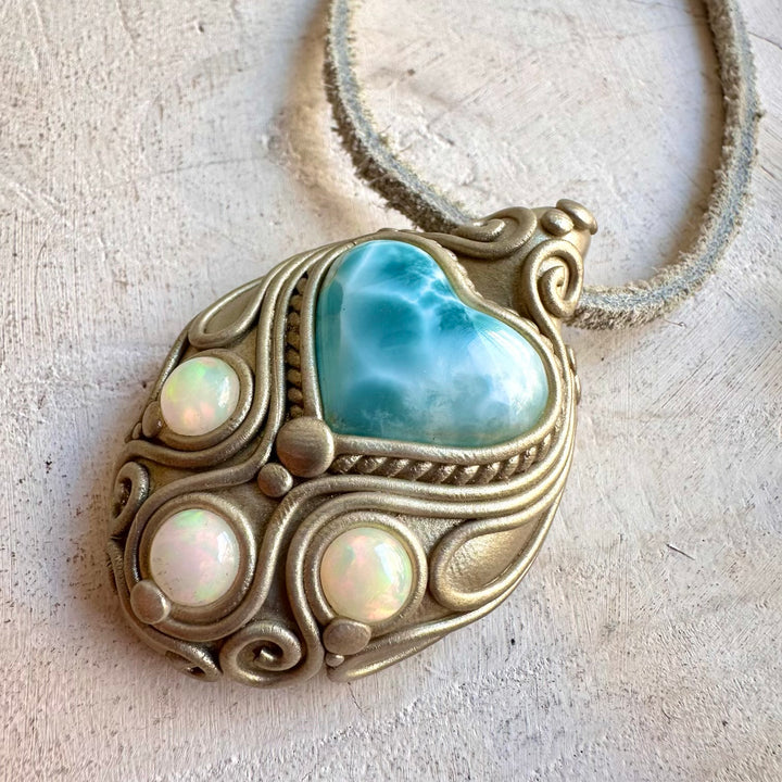 Larimar Heart and Ethiopian Opal pendant necklace, handcrafted as unique gemstone jewelry.