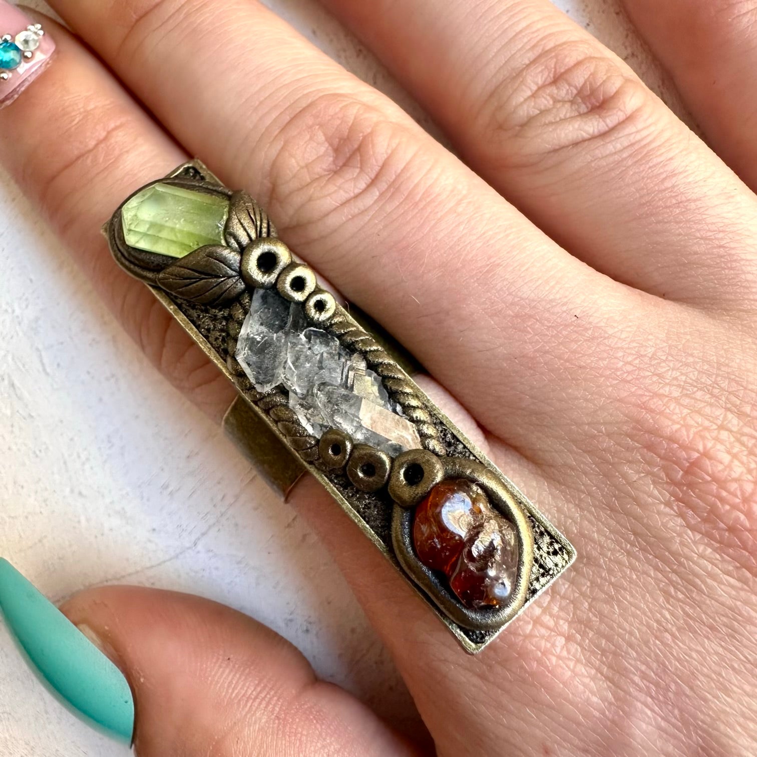 Faden quartz with peridot and hessonite garnet statement ring