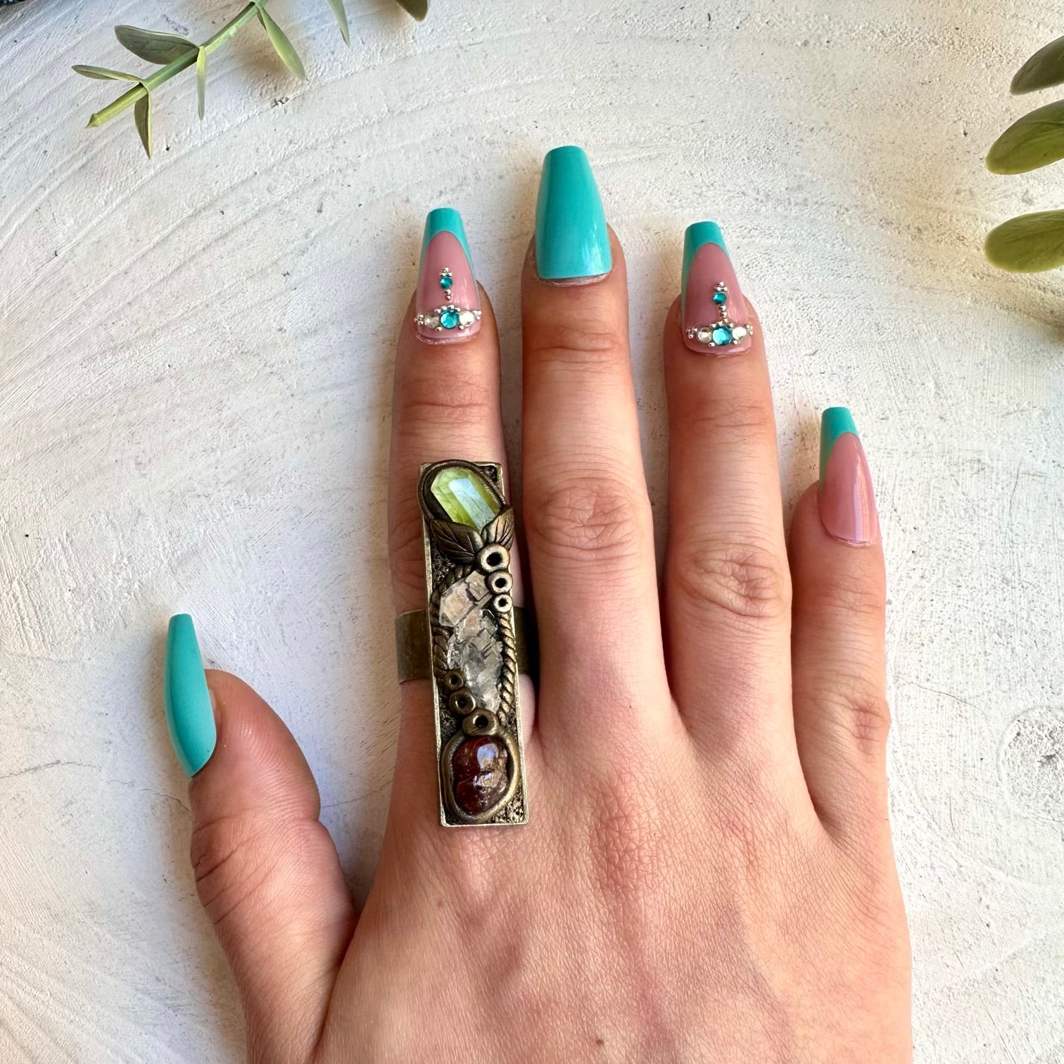 Handmade ring with faden quartz peridot and hessonite garnet