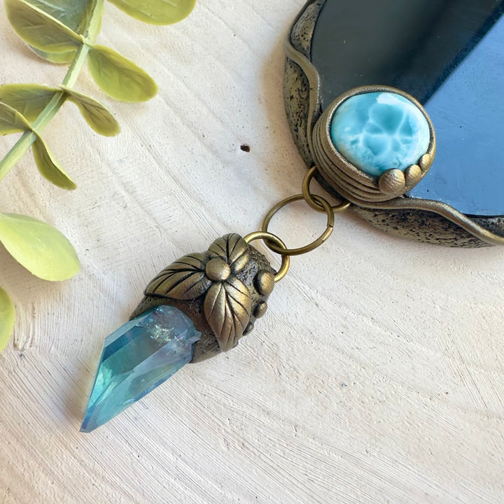 Black Obsidian mirror surrounded by Larimar and Labradorite gemstones