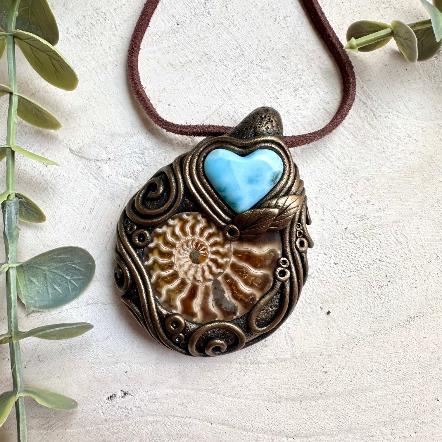Fairycore healing crystal necklace with larimar heart pendant and ammonite fossil accents