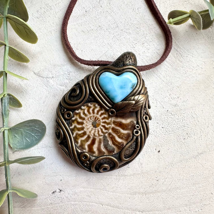Fairycore healing crystal necklace with larimar heart pendant and ammonite fossil accents