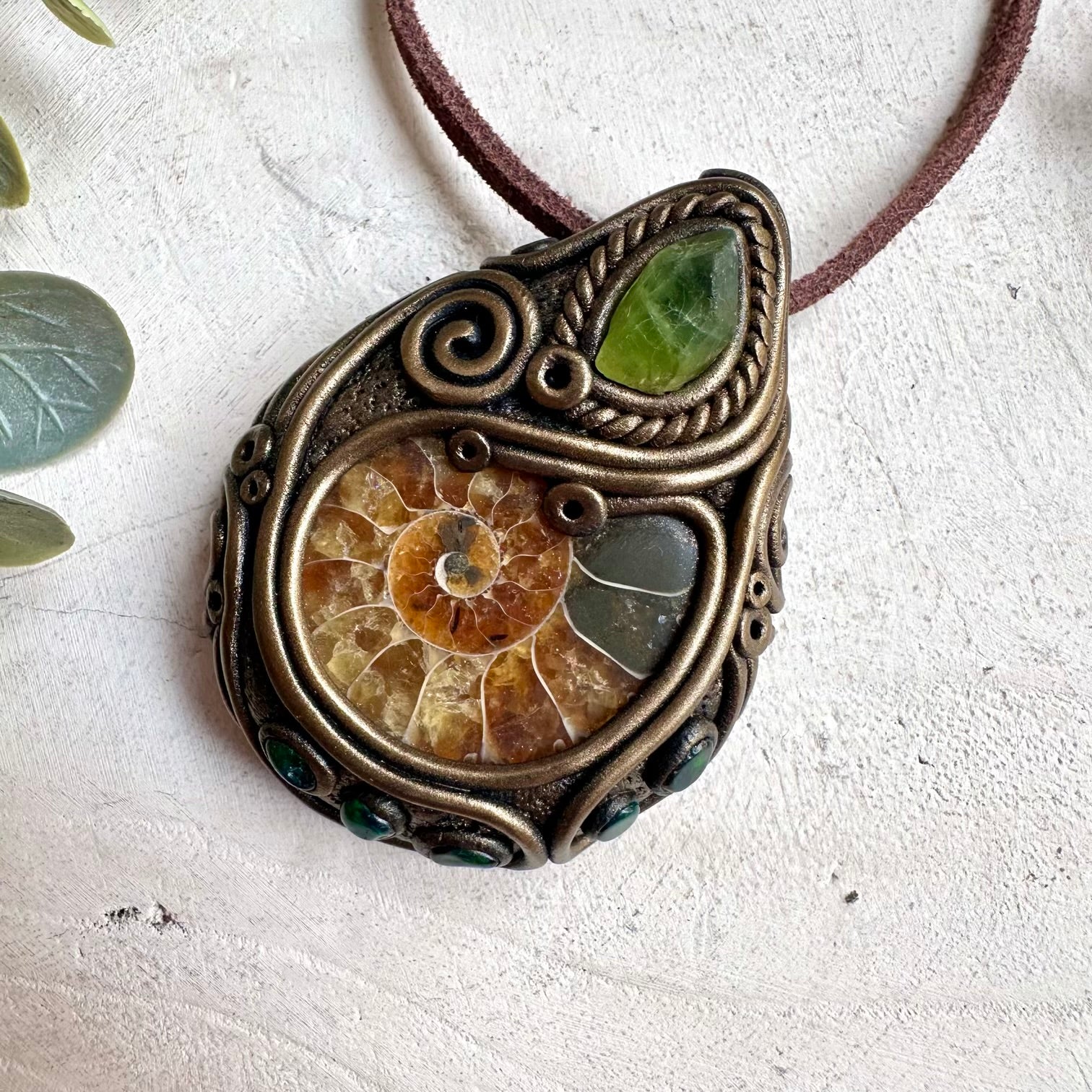 Fantasy fairy jewelry necklace with black Ethiopian opal, ammonite fossil, and healing crystals