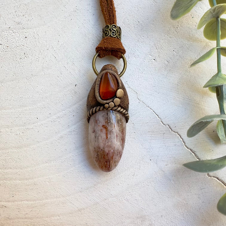 Handmade spiritual jewelry with Amber and Hematite Quartz