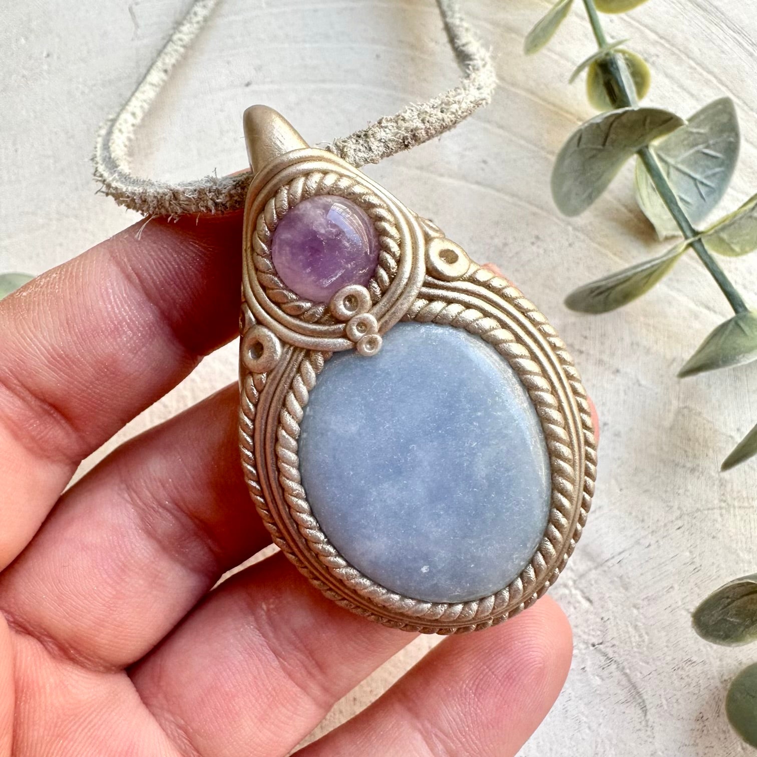 Protection amulet crystal necklace with angelite and amethyst gemstones
