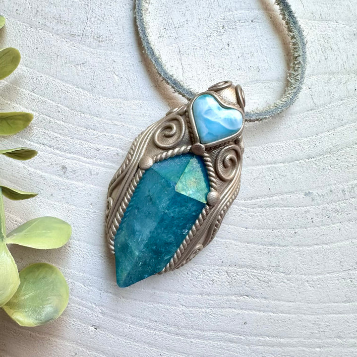 Handmade gemstone necklace with larimar heart and aqua aura