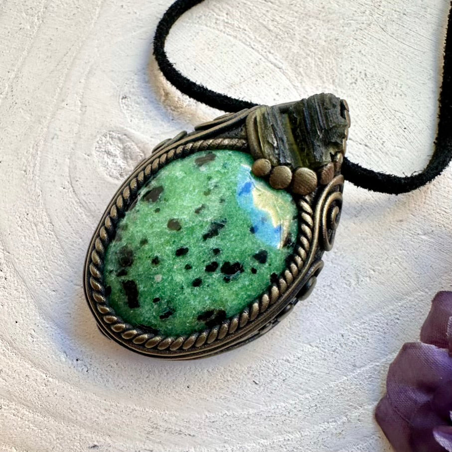 Healing raw crystal talisman necklace featuring ethically sourced Moldavite and Zoisite gemstone pendant, handmade with intention.