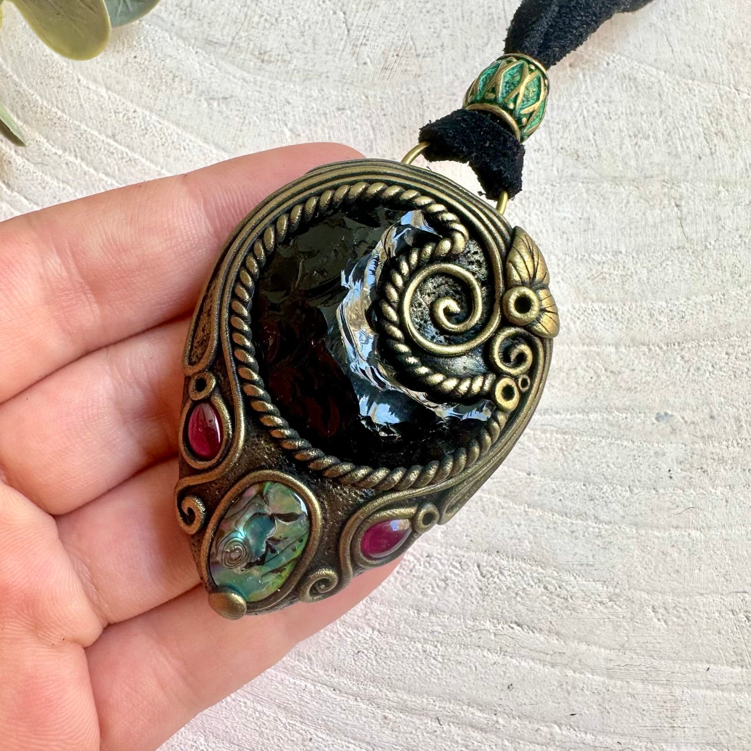 Spiritual gemstone necklace designed with a Black Obsidian Moon for protection and grounding.