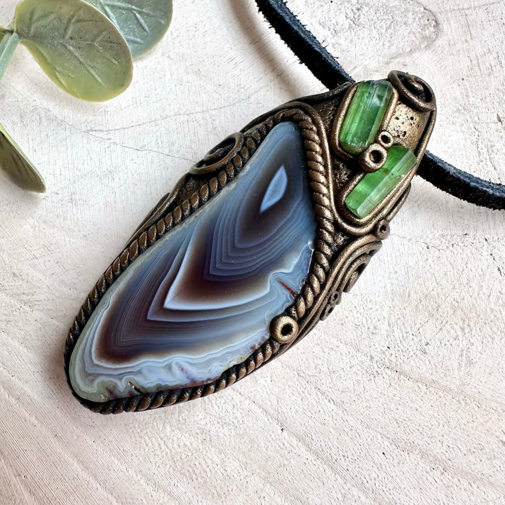 Fantasy-inspired healing crystal necklace with natural Botswana Agate and Green Tourmaline gemstones.