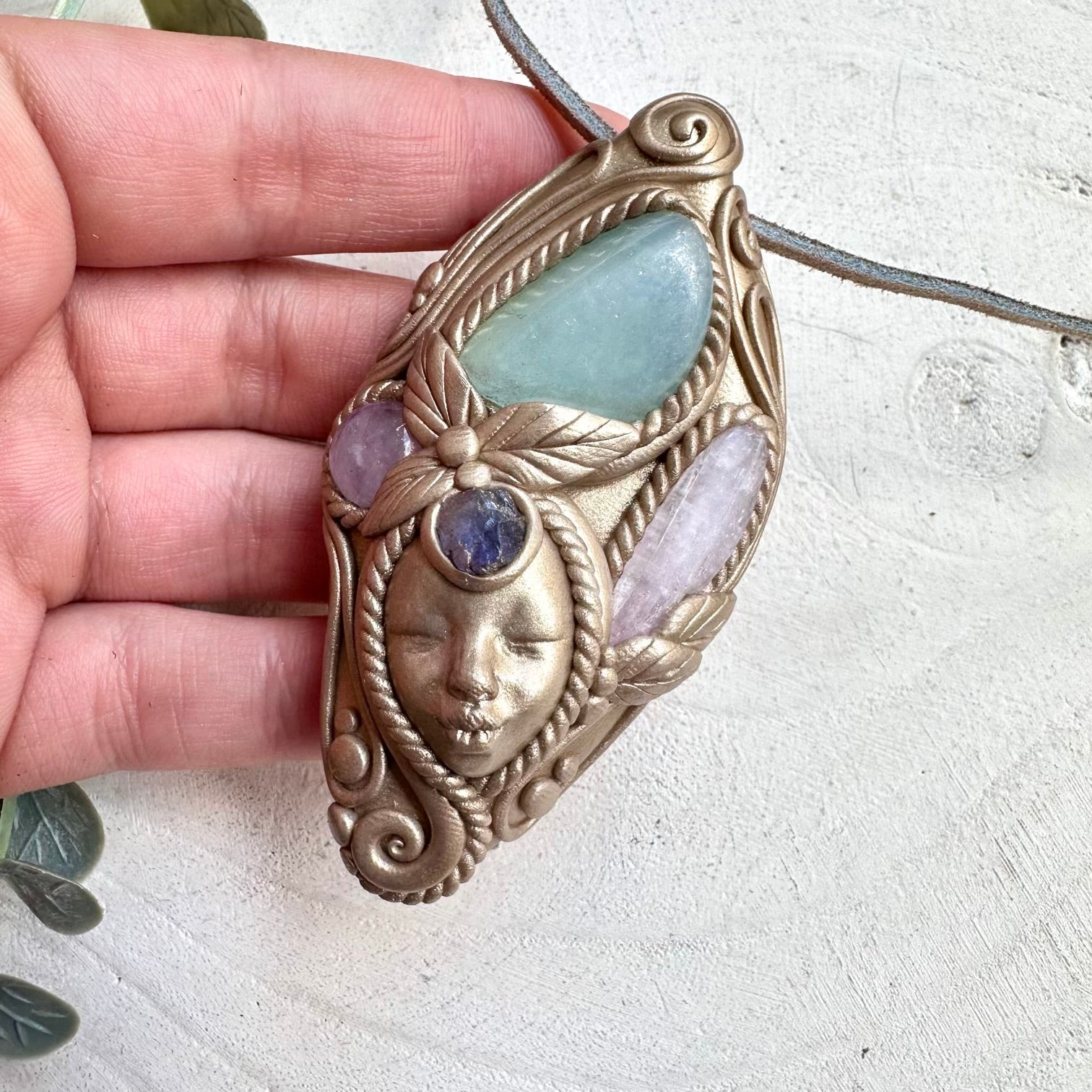 Goddess clay necklace with aquamarine kunzite amethyst and raw tanzanite