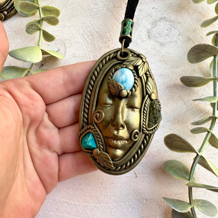 Handmade gemstone necklace combining Larimar with Raw Chrysocolla and Moldavite.