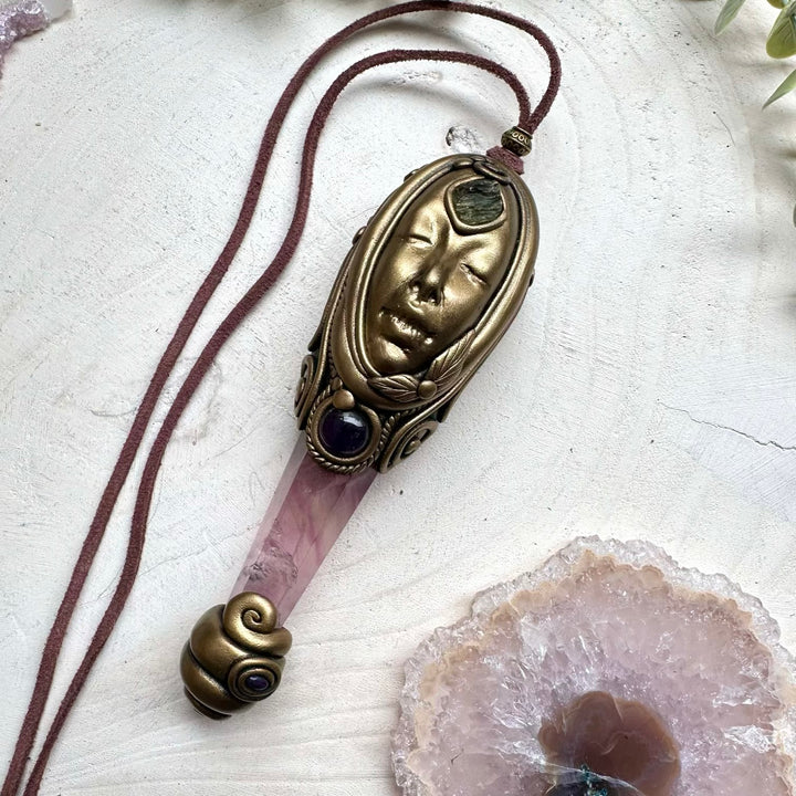 Healing crystal pendant with moldavite and black opal