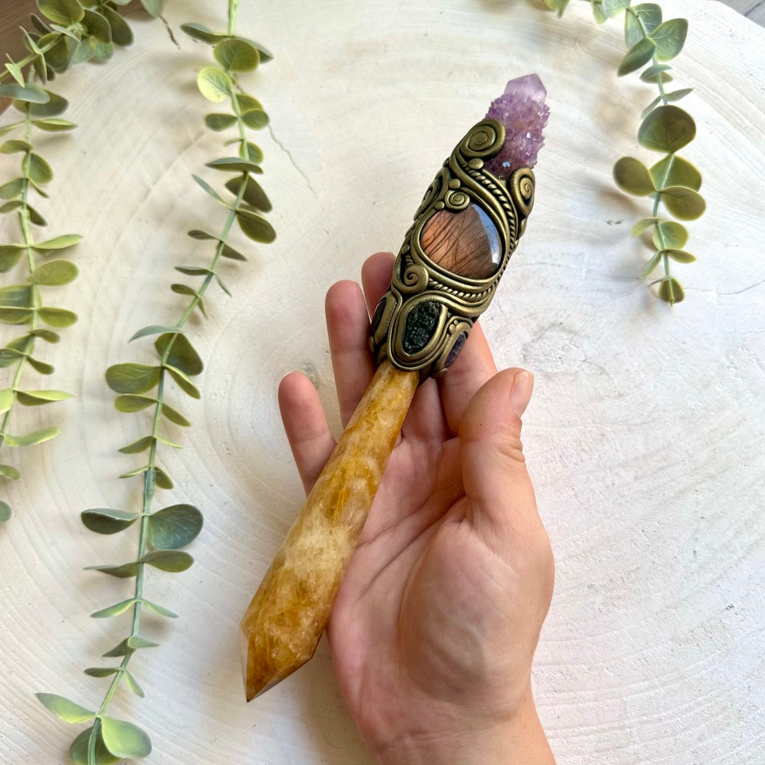 One of a kind crystal wand featuring Golden Healer Quartz and genuine natural healing crystals and stones.