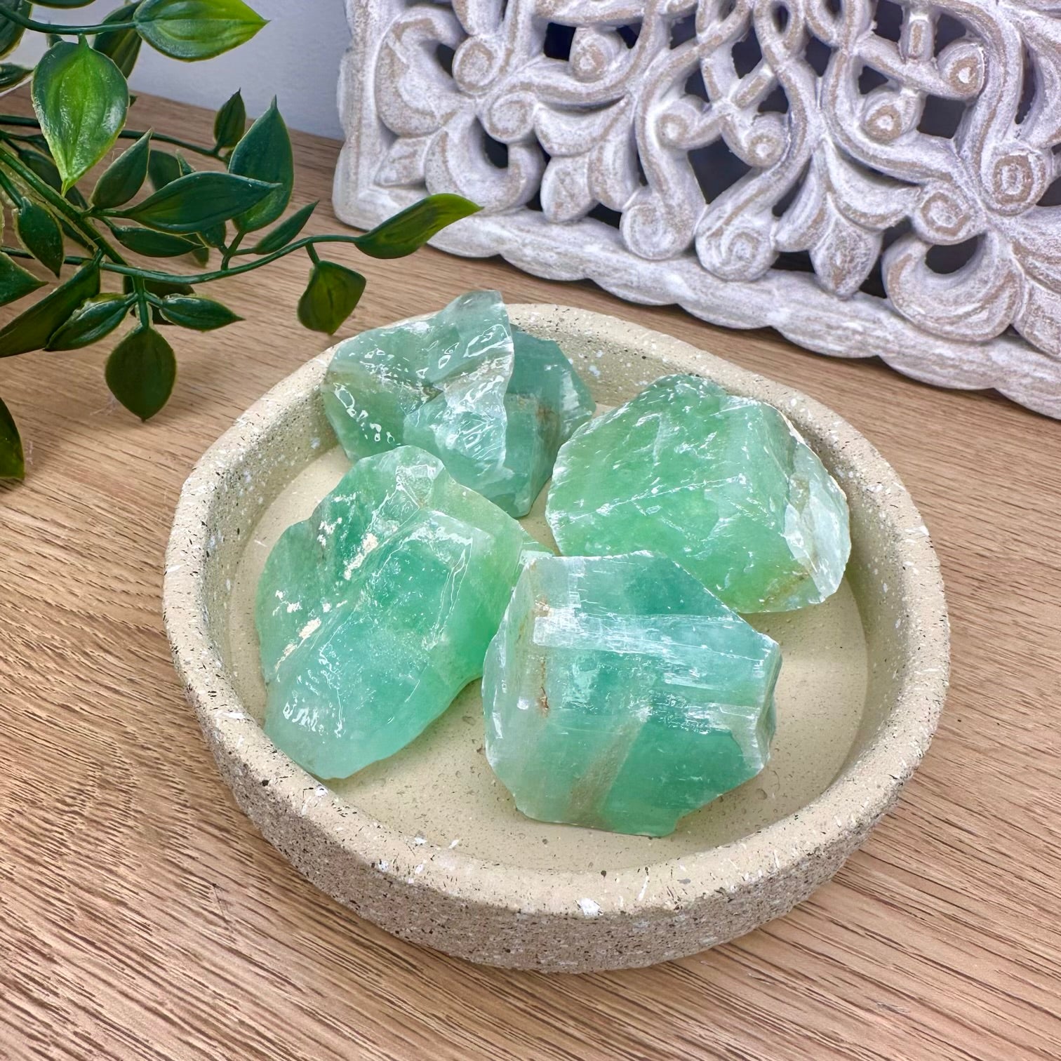 Green calcite crystal used for heart chakra healing