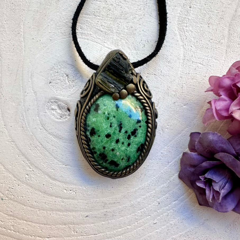 One-of-a-kind raw Moldavite crystal pendant paired with natural Zoisite gemstone, handcrafted spiritual amulet necklace.