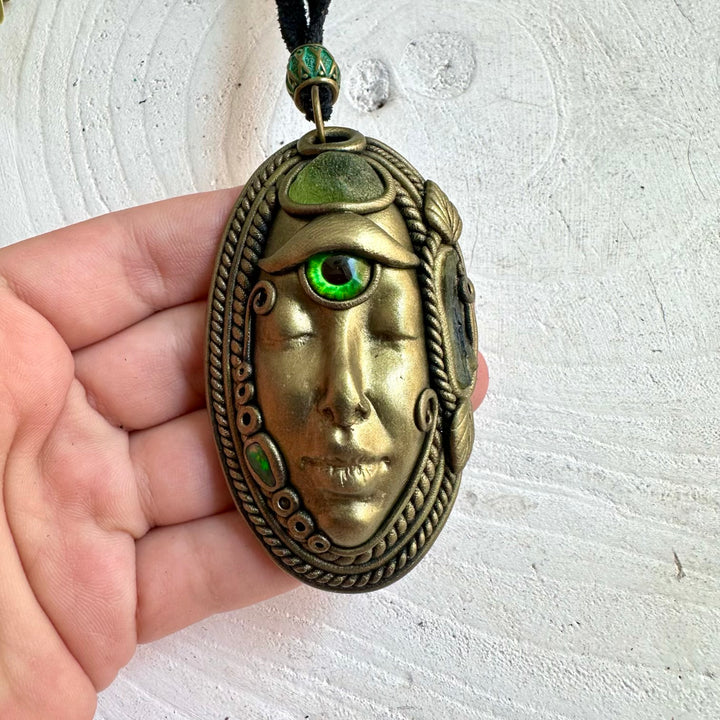 Unique Third Eye Goddess jewelry featuring vibrant green Peridot and natural Moldavite.