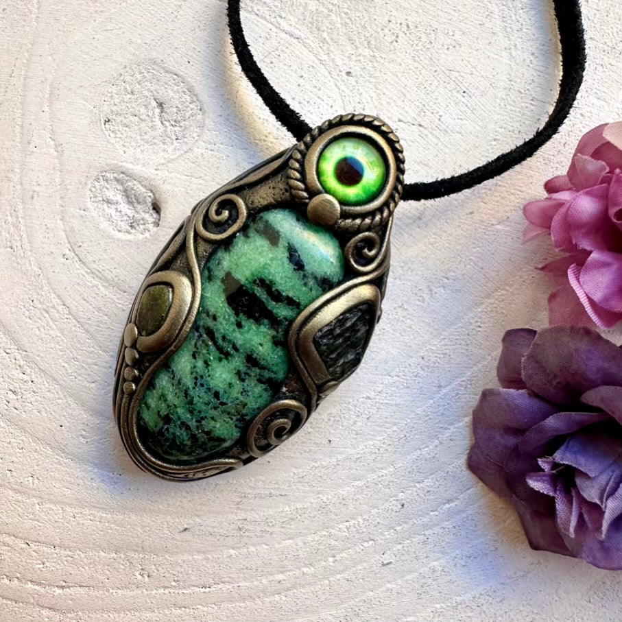 Ethically handcrafted Zoisite and raw-look Moldavite with bi-tone pink-green Tourmaline eye amulet, wearable spiritual protection talisman necklace.
