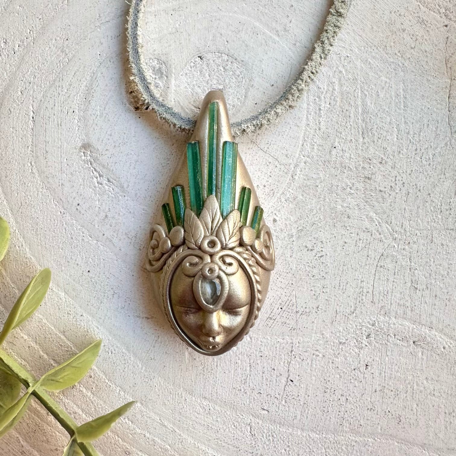 Crystal talisman necklace with green tourmaline and blue topaz healing stones