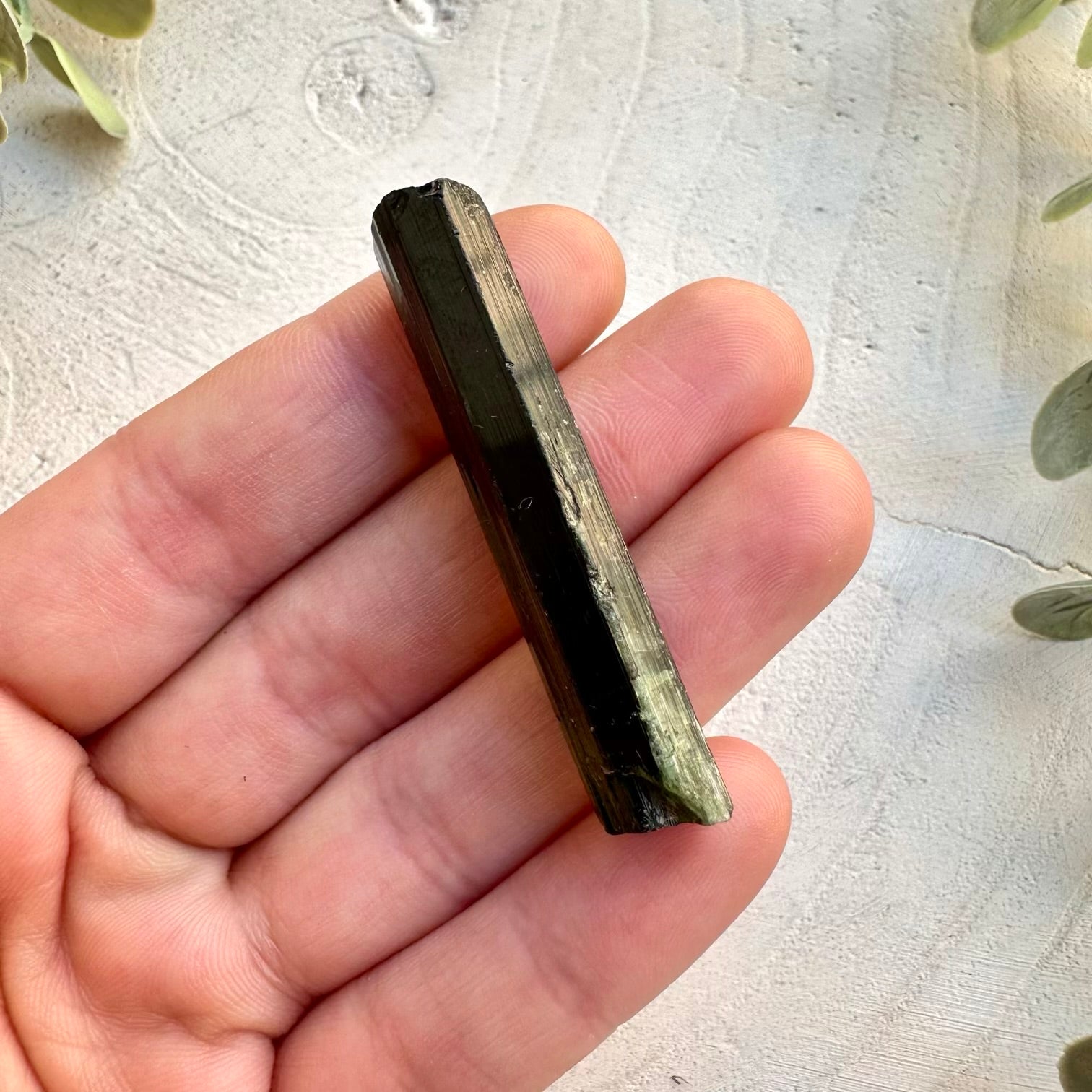 Natural green tourmaline crystal specimen