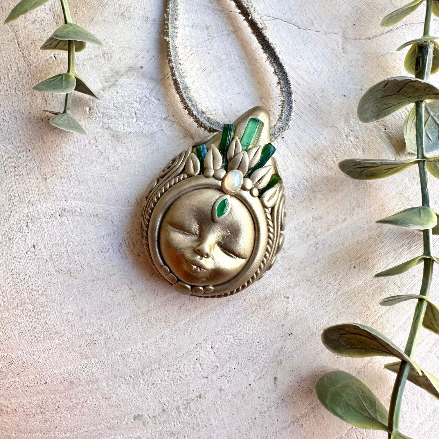 Handmade healing crystal necklace featuring Green Tourmaline, Ethiopian Opal and Emerald.