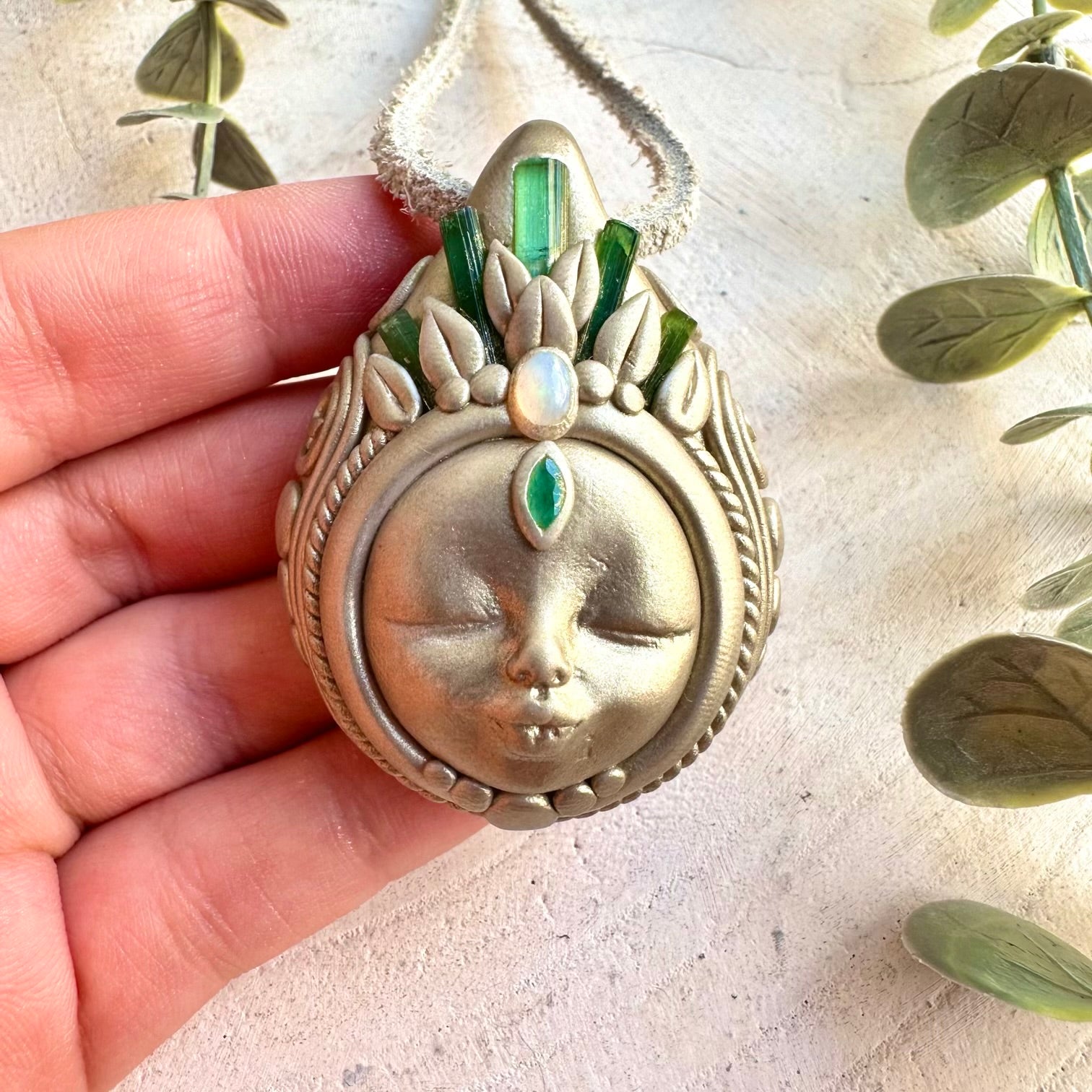 Unique Goddess necklace featuring natural Green Tourmaline with iridescent Ethiopian Opal and Emerald accents.