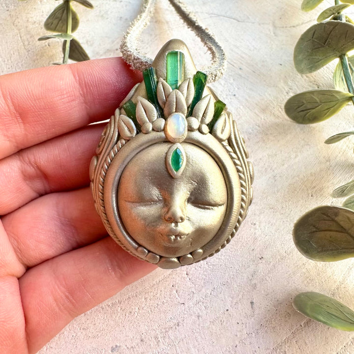 Unique Goddess necklace featuring natural Green Tourmaline with iridescent Ethiopian Opal and Emerald accents.