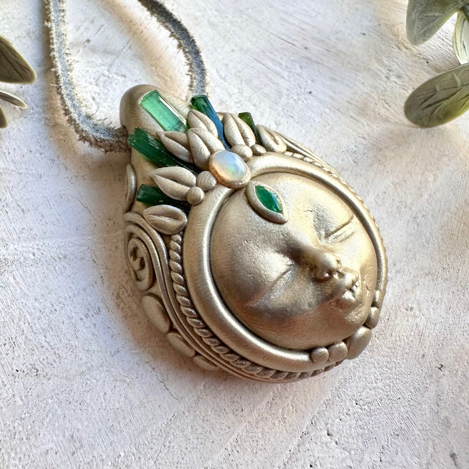 Handmade Green Tourmaline Goddess necklace featuring Ethiopian Opal and Emerald, a one of a kind spiritual gemstone jewelry piece combining lush green gemstones with mesmerizing Opal flashes.