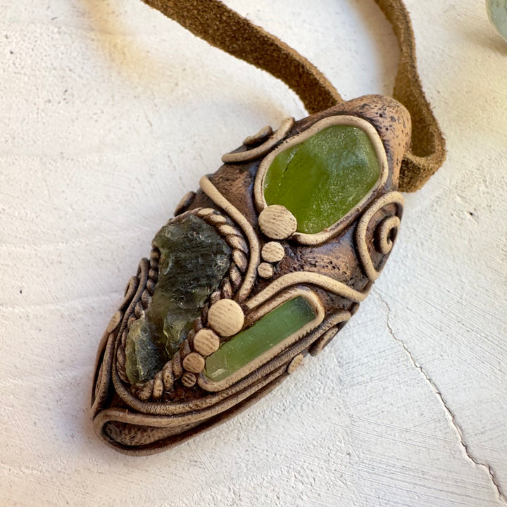 Metaphysical jewelry featuring Moldavite, Peridot and Green Tourmaline