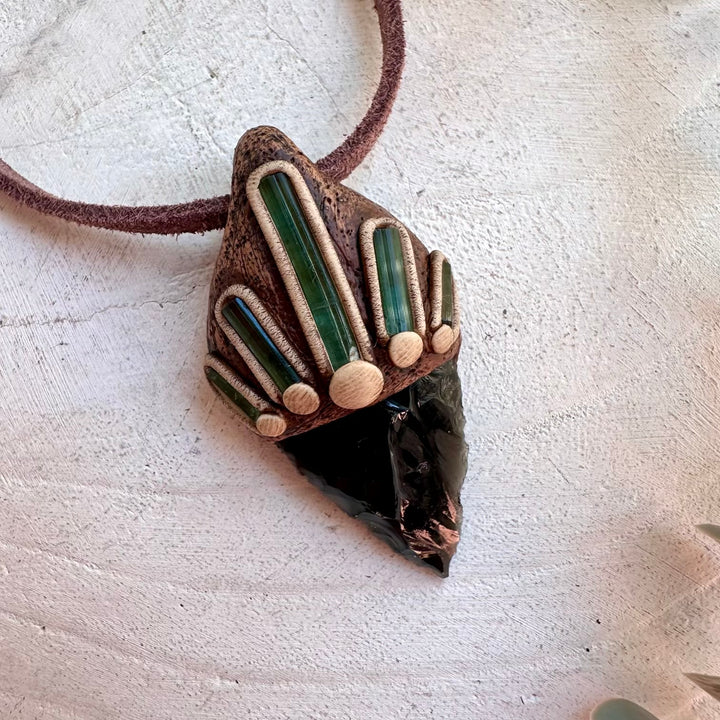 Handmade spiritual necklace with grounding and heart healing gemstones