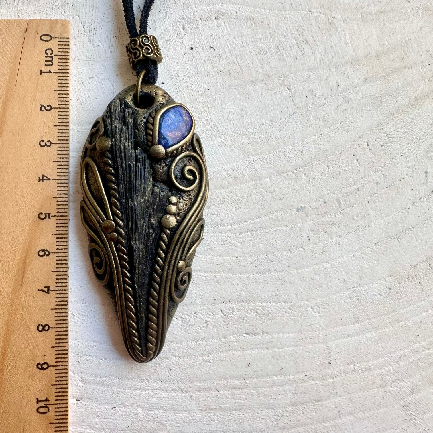 Handmade Black Kyanite and Lapis Lazuli unisex pendant necklace, a one of a kind crystal talisman designed for grounding, protection, intuition and inner wisdom.
